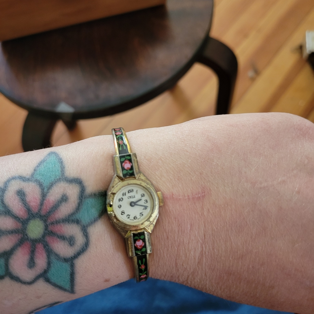 Women's Gold and Black Floral Watch - Picture 2 of 7